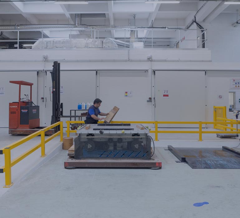 A man doing a check-up on a packaging