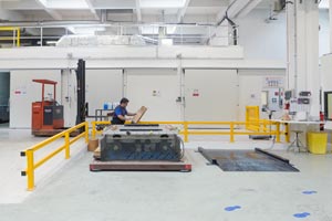 A man doing a check-up on a packaging