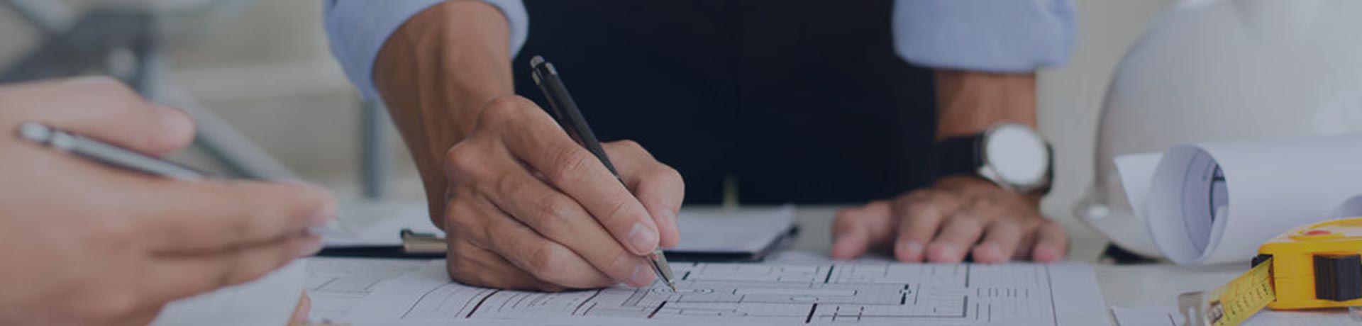 Men drafting infrastructures