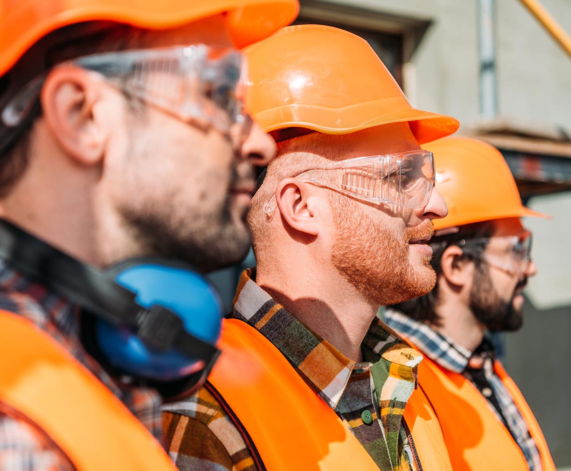 Three men supervising of civil engineering work