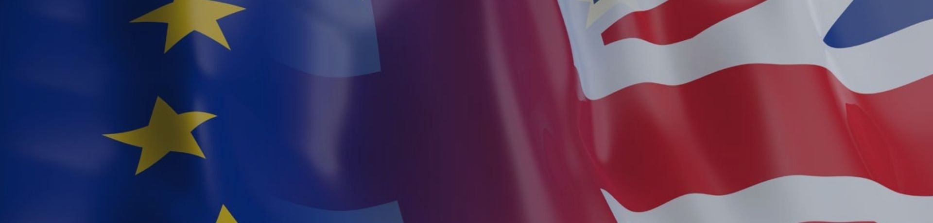  European Union (EU) and United Kingdom (UK) flags overlapping, symbolizing the relationship and politics between the two regions.