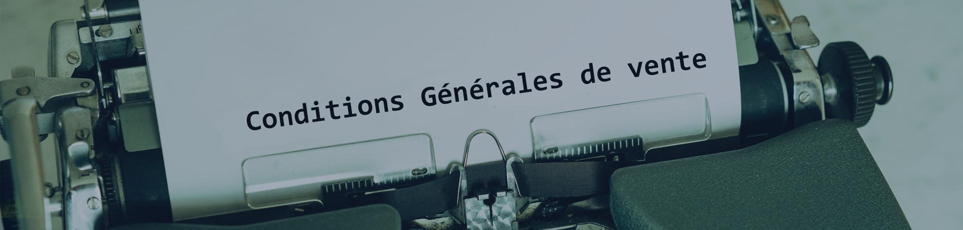 machine à écrire avec une feuille marqué Conditions générales de vente