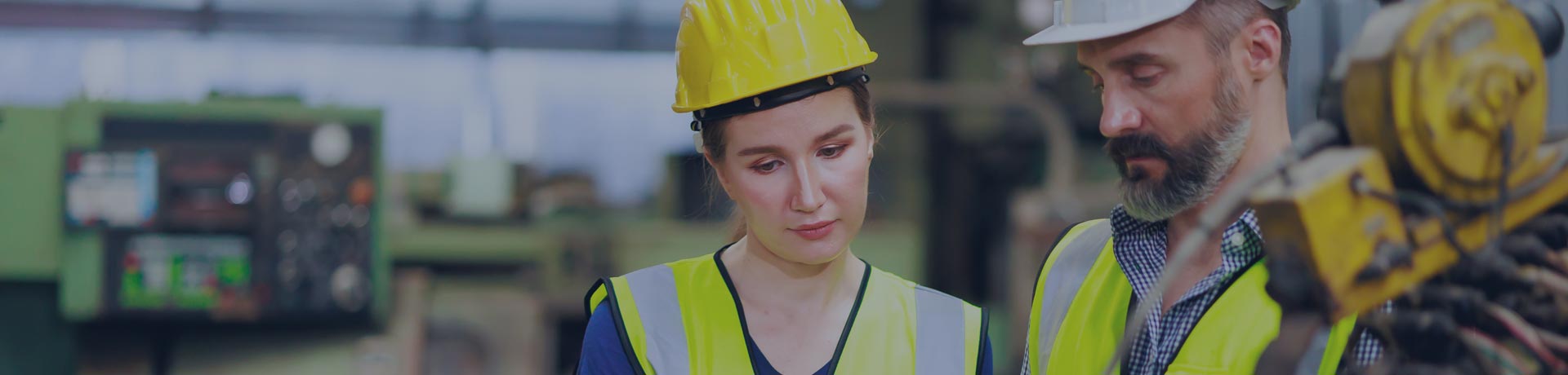 young Apave recruit with his manager on a client site