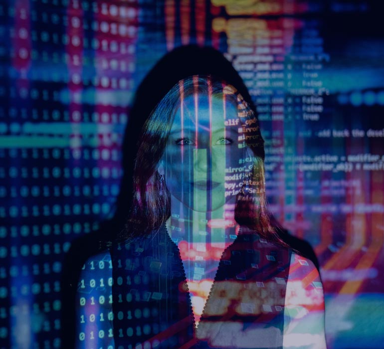 woman's face with lines of code representing digital risk
